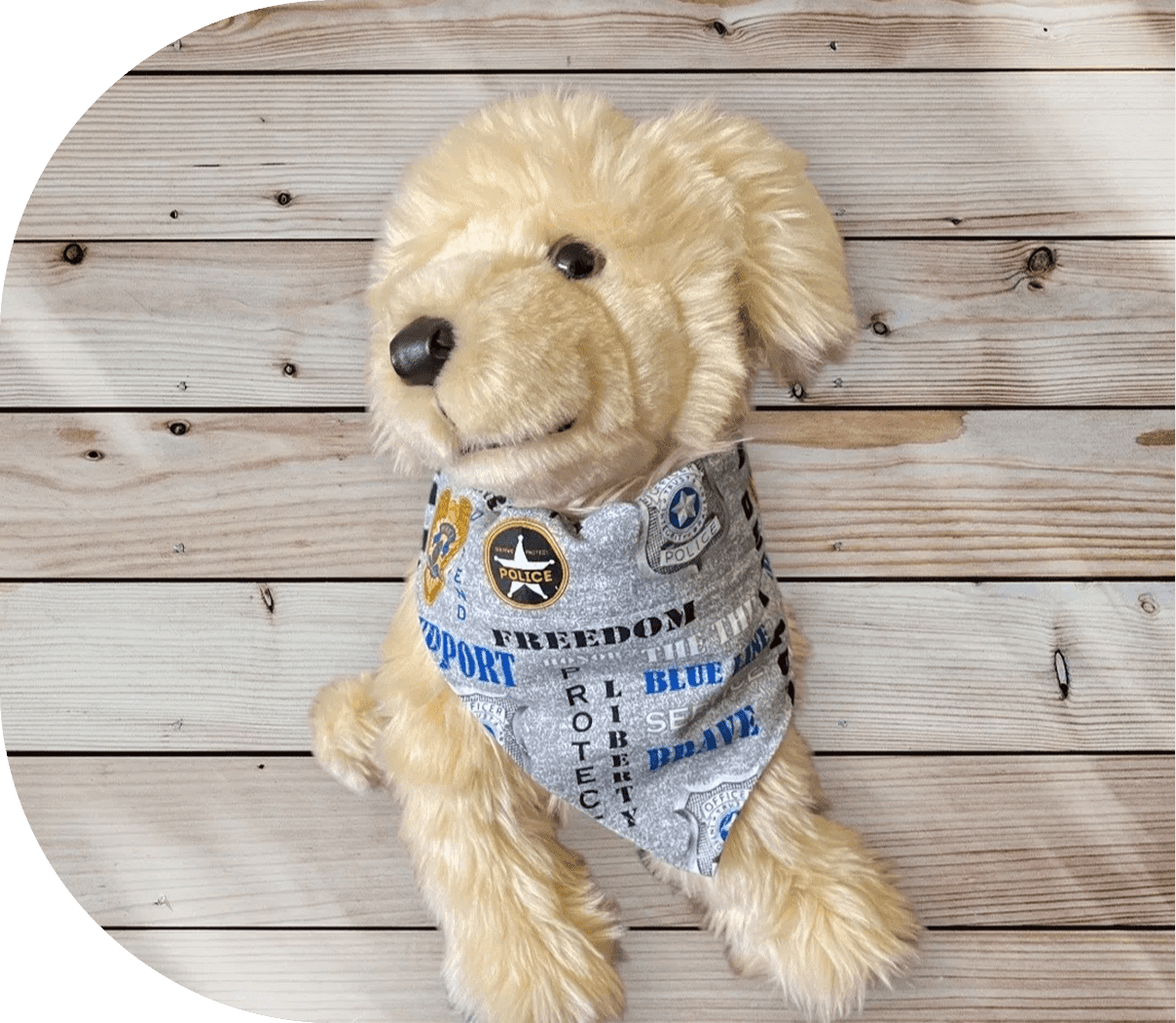 Plush dog with a decorative bandana.