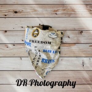 Decorative mask with freedom-themed text on a wooden surface.