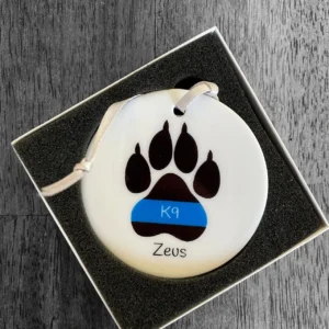K9 paw print ornament in gift box.
